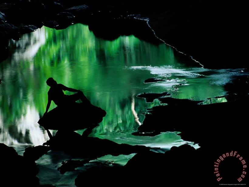 Raymond Gehman A Man Is Silhouetted Against an Emerald Green Pool of Water Art Painting