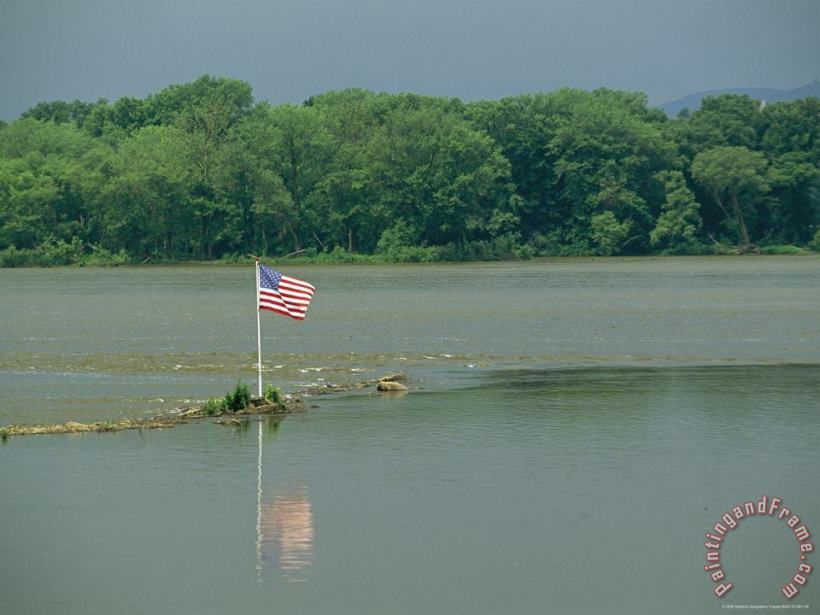 Raymond Gehman An American Flag Marks a Rock Outcrop Near a Ferry Crossing Art Print