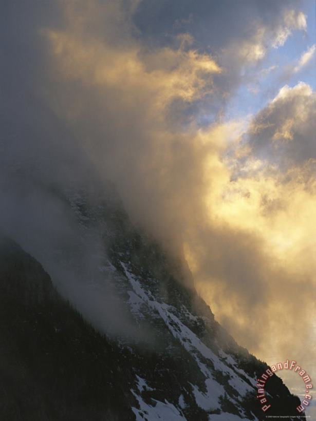 Raymond Gehman Clouds Obscure Mount Oberlin Along The Logan Pass Art Print