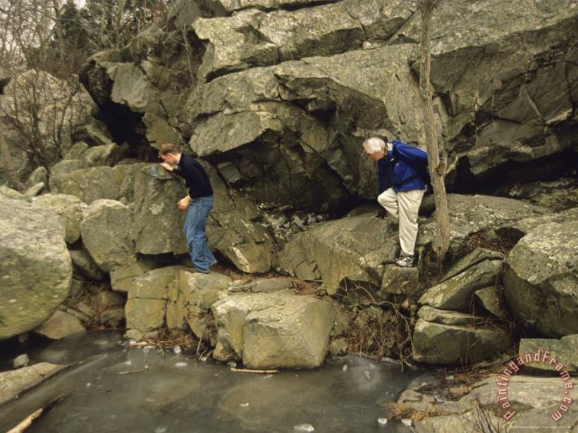 Raymond Gehman Hikers Climb a Rock Formation on Great Falls Billy Goat Trail Art Print