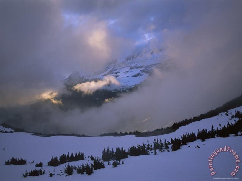 Raymond Gehman Snow And Clouds Fill The Valley at The Garden Wall in Logan Pass Art Print