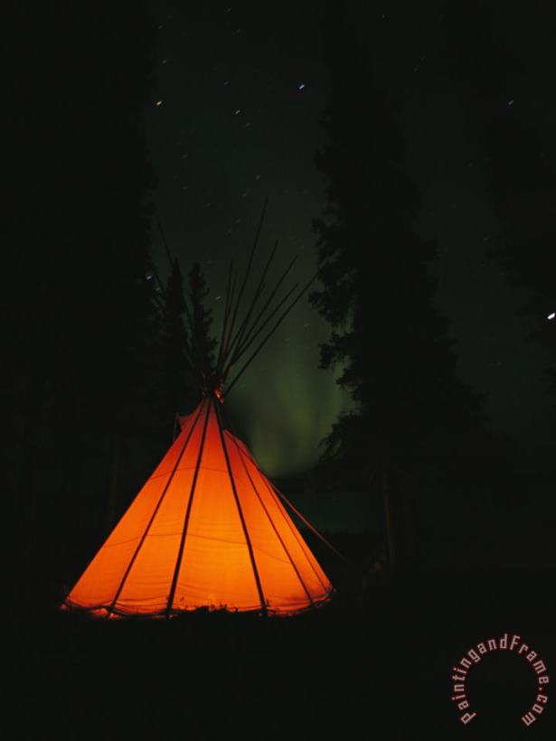 The Glow From a Campfire Makes a Shadow on a Tepee painting - Raymond Gehman The Glow From a Campfire Makes a Shadow on a Tepee Art Print