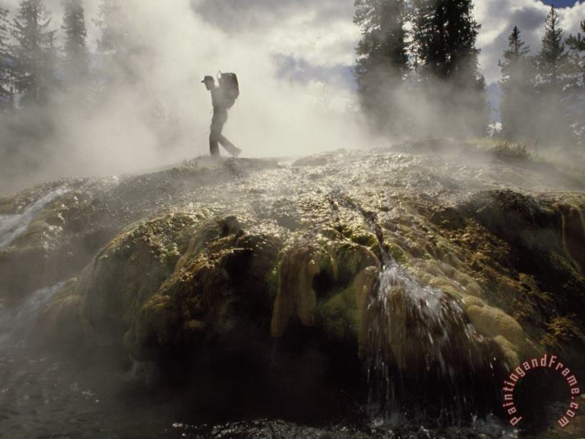 Venting Steam Veils a Hiker Skirting a Hot Spring in The Bechler Backcountry painting - Raymond Gehman Venting Steam Veils a Hiker Skirting a Hot Spring in The Bechler Backcountry Art Print
