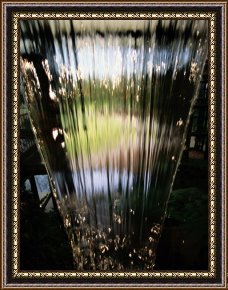 The Waterfall Framed Paintings - A Sheet of Water Cascading Down an Indoor Waterfall by Raymond Gehman