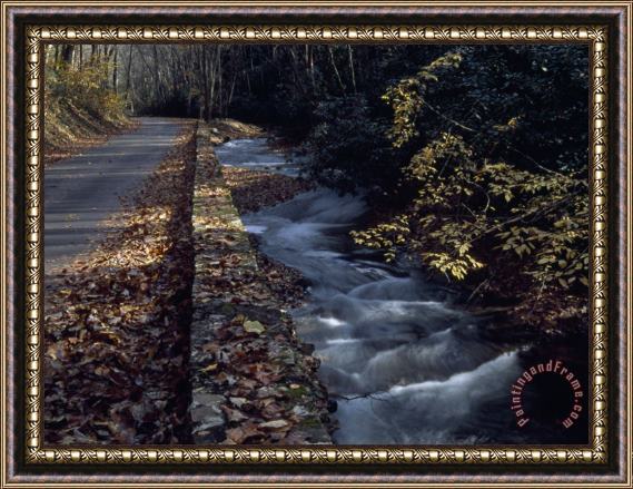 Raymond Gehman Autumn View of a Park Road Running Along Island Lick Creek Framed Print