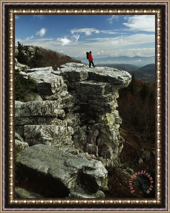 Raymond Gehman Hiker Standing at The Edge of a Rock Outcrop on a Cliff Framed Painting
