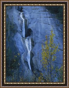 The Waterfall Framed Paintings - Scenic View of a Waterfall Streaming Over a Cliff Face by Raymond Gehman