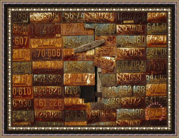Raymond Gehman Side of a Building Adorned with Old License Plates Framed Painting