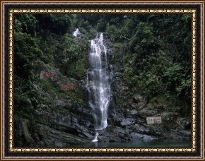 The Waterfall Framed Paintings - Waterfall Cascading Down Rock Face in Subtropical Rainforest by Raymond Gehman