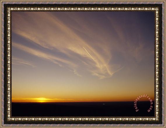 Raymond Gehman Wispy Clouds And Jet Vapor Trail in The Sky at Sunset Framed Painting
