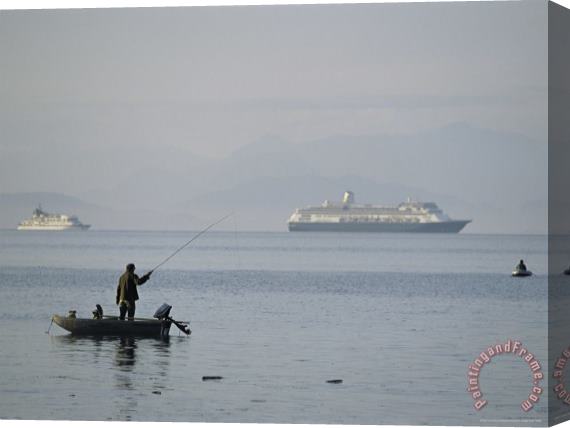 Raymond Gehman Cruise Ships Pass by a Man Out Fishing on a Hazy Morning Stretched Canvas Print / Canvas Art