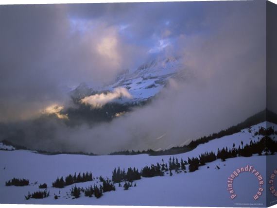 Raymond Gehman Snow And Clouds Fill The Valley at The Garden Wall in Logan Pass Stretched Canvas Painting / Canvas Art