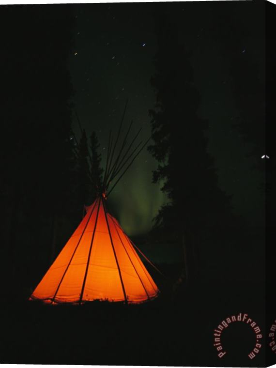 Raymond Gehman The Glow From a Campfire Makes a Shadow on a Tepee Stretched Canvas Painting / Canvas Art