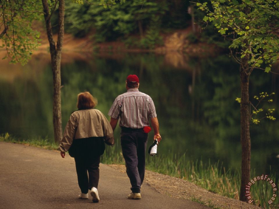 Raymond Gehman Couple Walking by The Water Along a Park