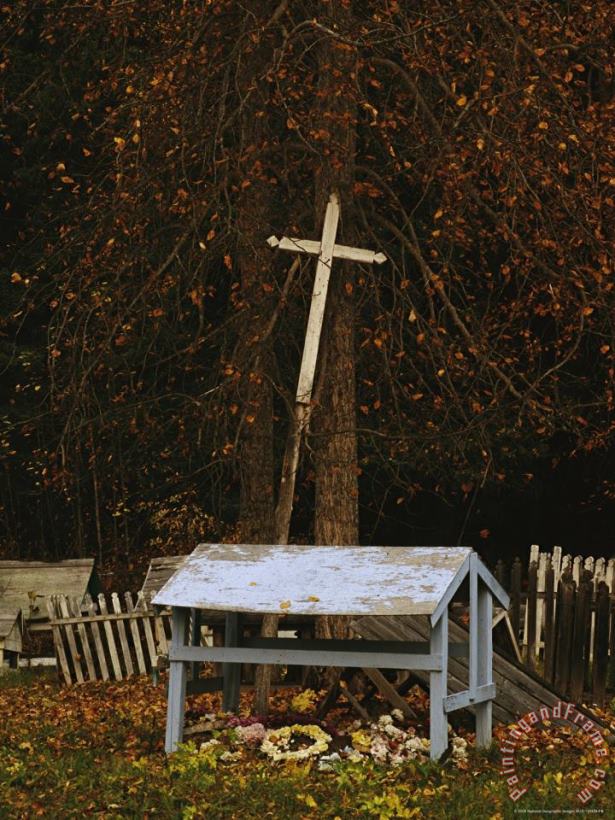 Raymond Gehman A Cross Leans Against a Tree in a Cemetery at St Annes Church Art Print