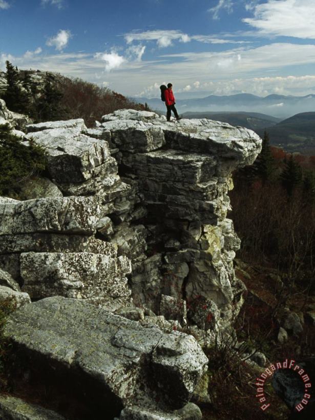 Raymond Gehman Hiker Standing at The Edge of a Rock Outcrop on a Cliff Art Print