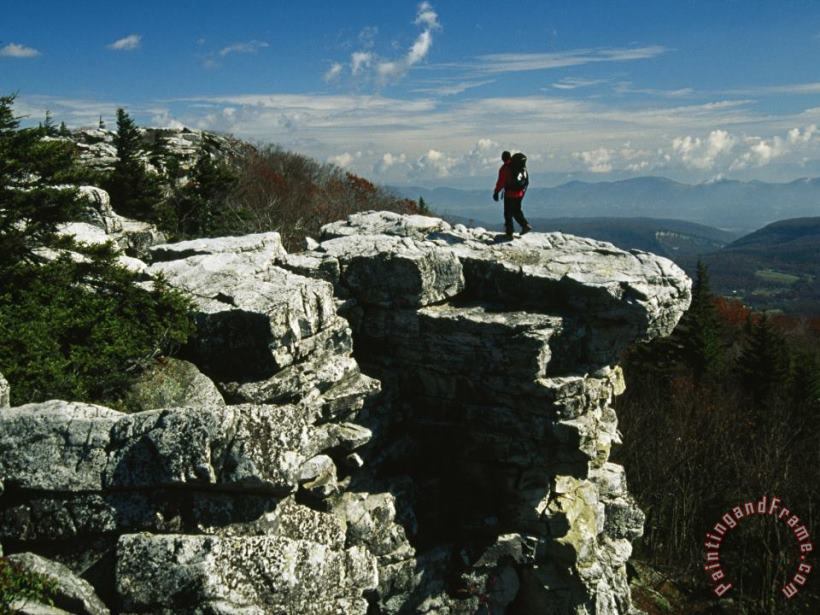 Raymond Gehman Hiker Standing at The Edge of a Rock Outcrop on a Mountain Art Print