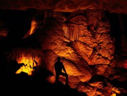 Raymond Gehman Person Silhouetted Against The Limestone Formations of The Pipe Organ