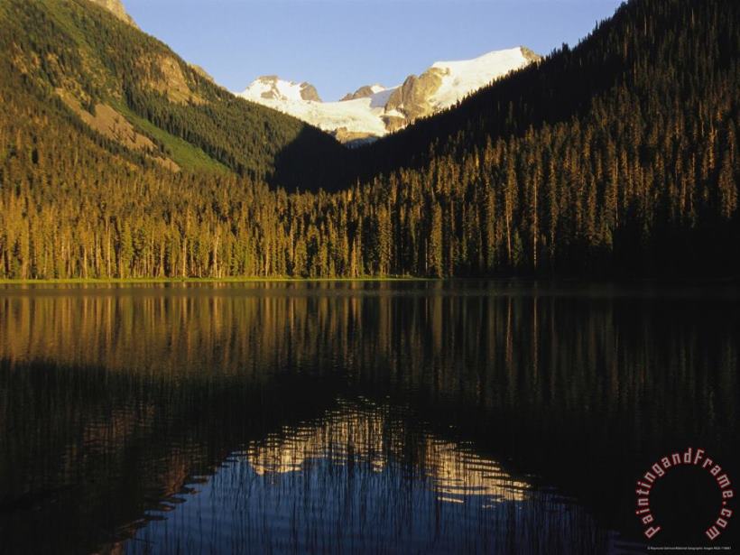 Raymond Gehman Snow Capped Mountains Reflect in a Lake Art Print