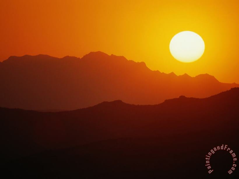 Sunset Over Silhouetted Mountain Ridges painting - Raymond Gehman Sunset Over Silhouetted Mountain Ridges Art Print