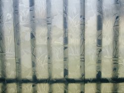 Raymond Gehman Wrought Iron Fence Is Seen Through a Cut Glass Window