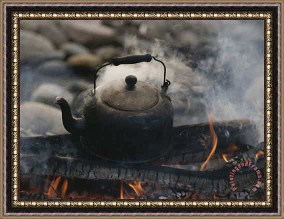 Raymond Gehman A Kettle of Water Comes to a Boil Over a Smoky Campfire Framed Painting