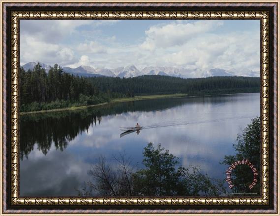 Raymond Gehman A Man Takes a Canoe Trip on a Body of Water Framed Painting