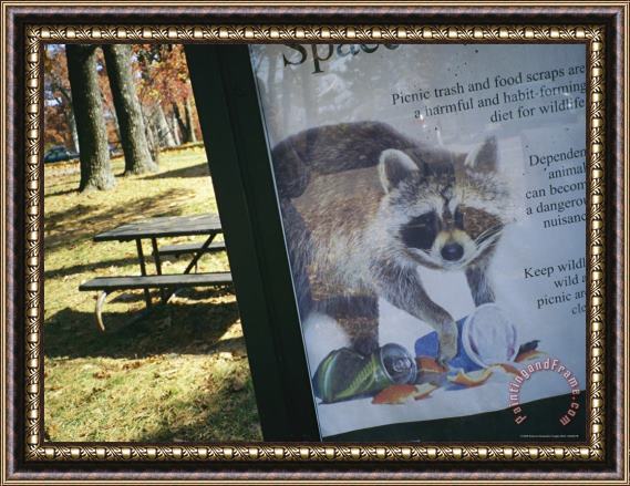 Raymond Gehman A Sign Warning of The Dangers of Litter in a Picnic Area Framed Print