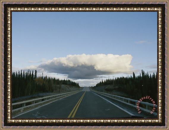 Raymond Gehman A Thundercloud Forms Above The Makenzie Highway Framed Painting