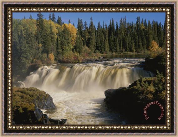 Raymond Gehman A Time Exposure of a Waterfall Cascading by a Forest During Autumn Framed Print