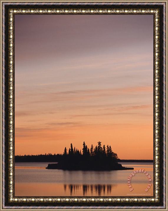 Raymond Gehman An Island in Rocky Lake Silhouetted Against The Evening Sky Framed Painting