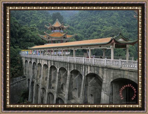 Raymond Gehman An Ornate Covered Bridge Over a Gorge on Dinghu Mountain Framed Painting