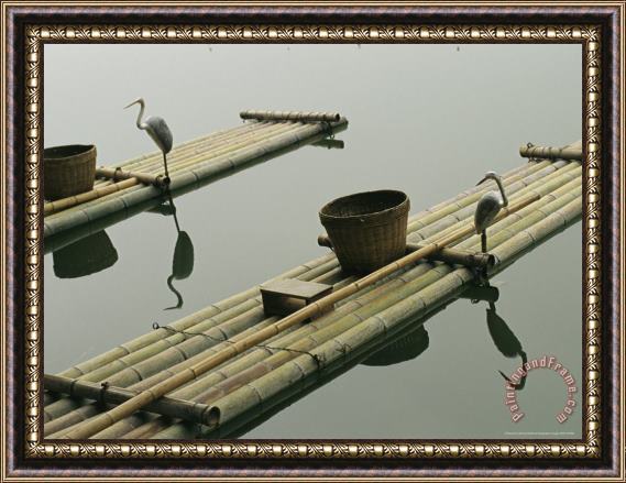 Raymond Gehman Bamboo Rafts with Heron Artwork And Baskets on a Calm Lake Framed Painting