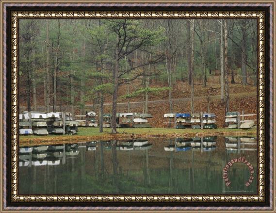 Raymond Gehman Boat Storage Reflected in Douthat Lake Framed Print