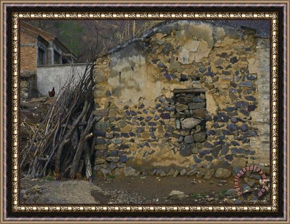 Raymond Gehman Firewood Stacked Against a Village Farmhouse Near Beijing Framed Painting