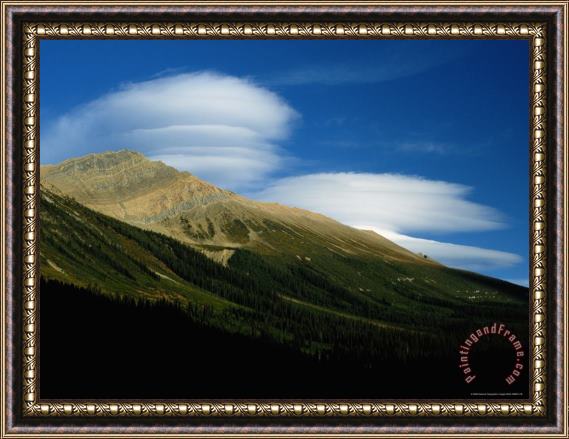 Raymond Gehman High Clouds Over a Mountainous Landscape Framed Print