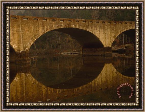 Raymond Gehman Highway Bridge And Its Reflection in The Cumberland River Framed Print