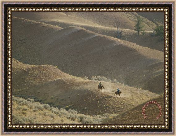 Raymond Gehman Horseback Riders in The Hills of Grand Teton National Park Framed Painting