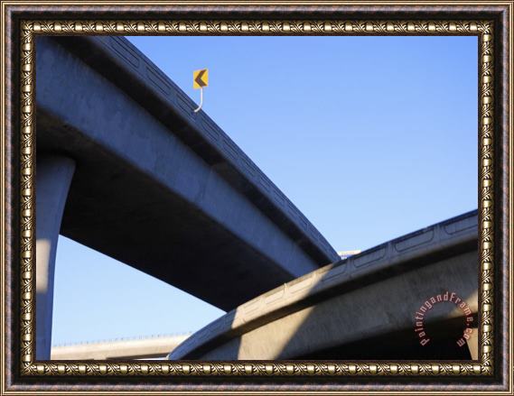 Raymond Gehman Low Angle View of Road Sign And Flyovers on Interstate Highway 5 Framed Painting