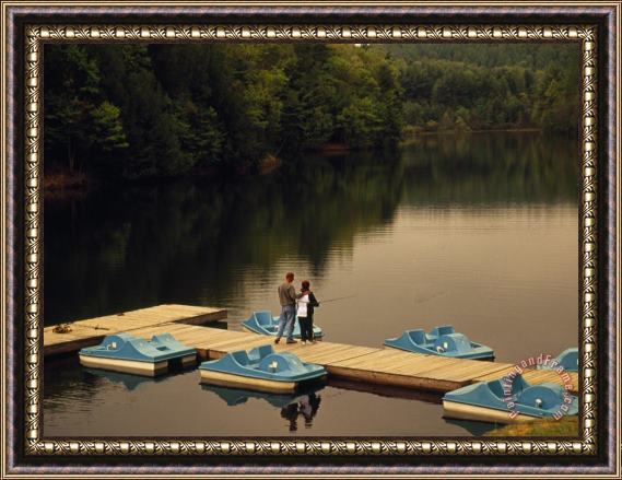 Raymond Gehman Man And Woman Enjoying Fishing From a Pier at Pipestem State Park Framed Painting
