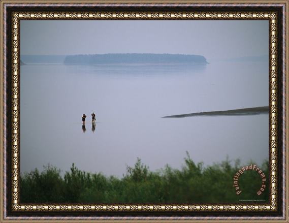 Raymond Gehman Mist Rises From The Mackenzie River As Two People Go Wading Framed Painting