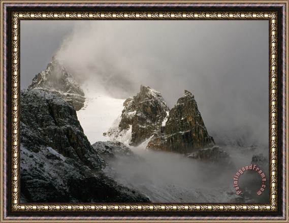 Raymond Gehman Mount Geikie Elevation 10 729 Feet Is Lost in The Clouds And Snow Framed Print