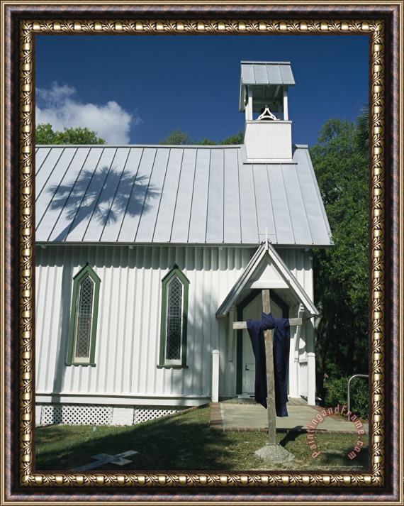 Raymond Gehman Palm Tree Casts a Shadow Onto The Tin Roof of an Old Church Framed Painting