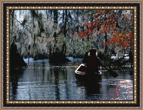 Raymond Gehman Park Ranger Canoeing Under Cypress Trees Draped with Spanish Moss Framed Painting
