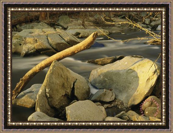 Raymond Gehman Rock Creek Rushes Past Large Boulders And Driftwood at Sunset Framed Painting