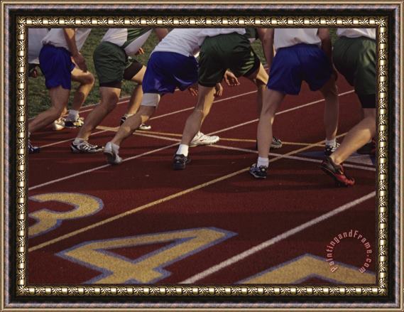 Raymond Gehman Runners Lined Up on a Track Ready for The Starting Gun Framed Painting