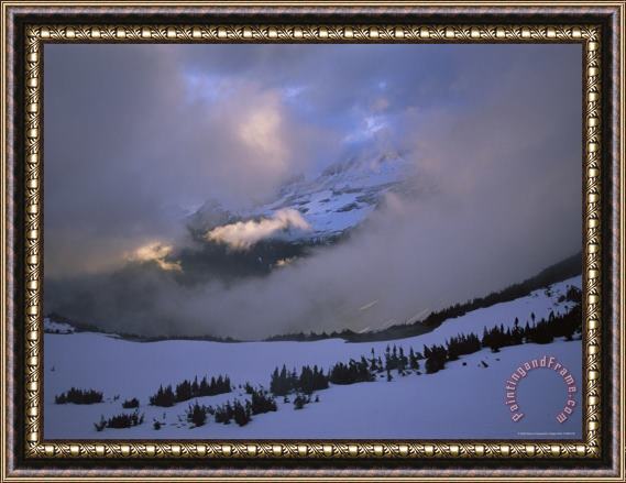 Raymond Gehman Snow And Clouds Fill The Valley at The Garden Wall in Logan Pass Framed Print