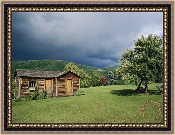Raymond Gehman Storm Clouds Form Above a Log Cabin on The Site of French Azilum Framed Painting