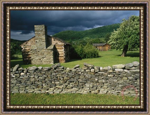 Raymond Gehman Storm Clouds Form Above Log Buildings on The Site of French Azilum Framed Painting