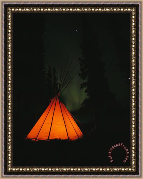 Raymond Gehman The Glow From a Campfire Makes a Shadow on a Tepee Framed Print